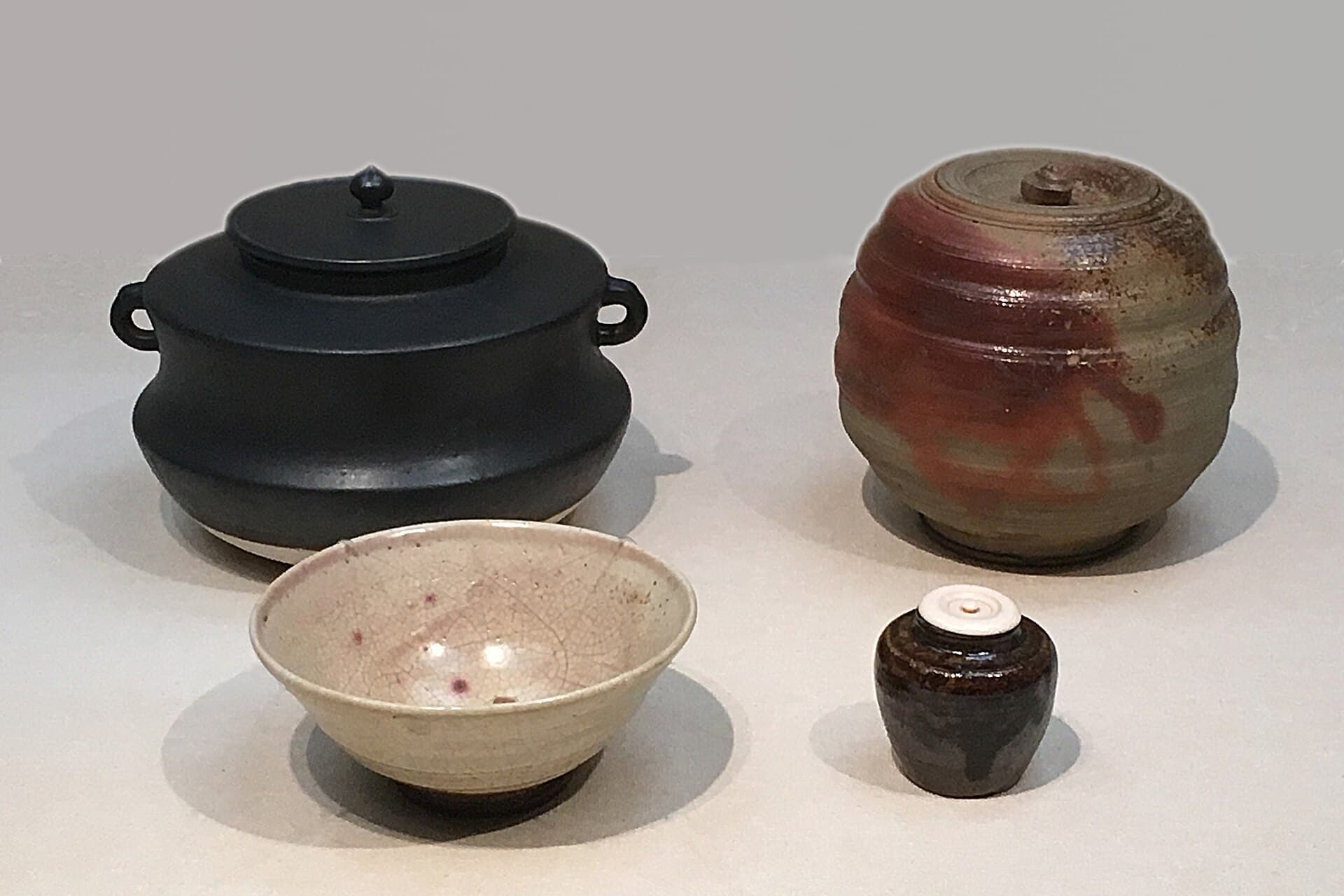 Ceramic vessels in a museum case
